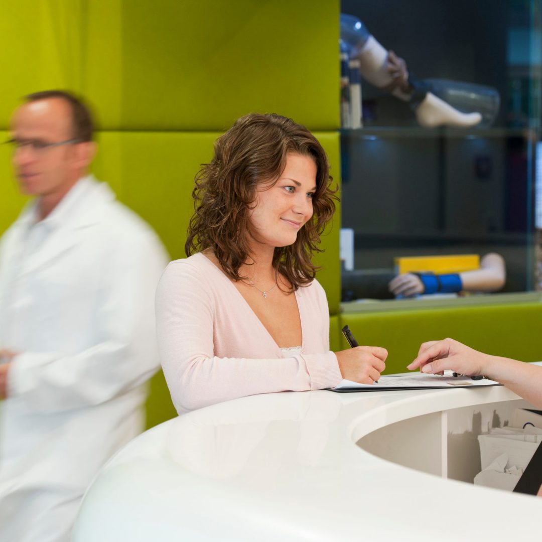 young-woman-filling-out-forms-at-doctor-s-office-2026-03-26-08-58-58-utc
